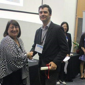 Dr. Frenţ at the award ceremony in London