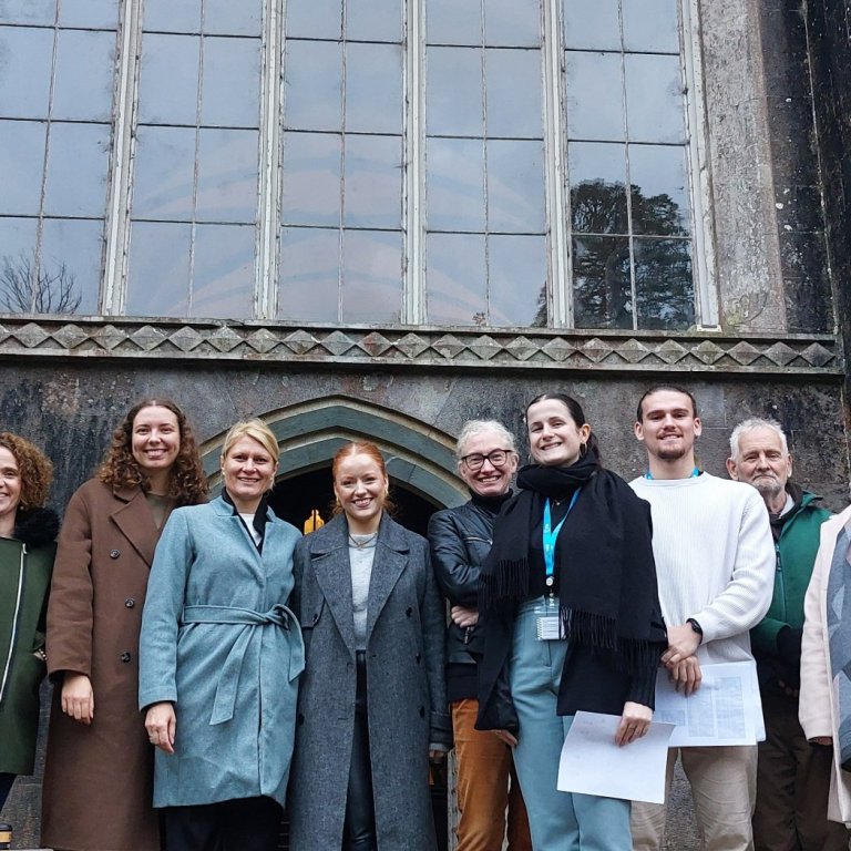 UPLIFT's partners in front of the castle